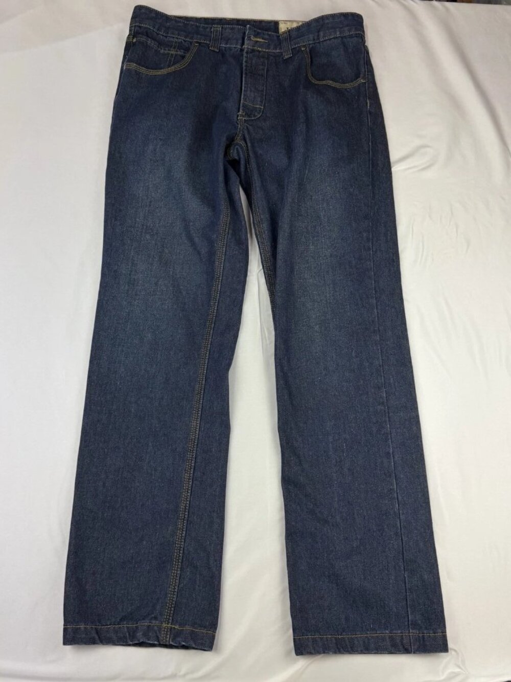 The lady's tight blue jeans